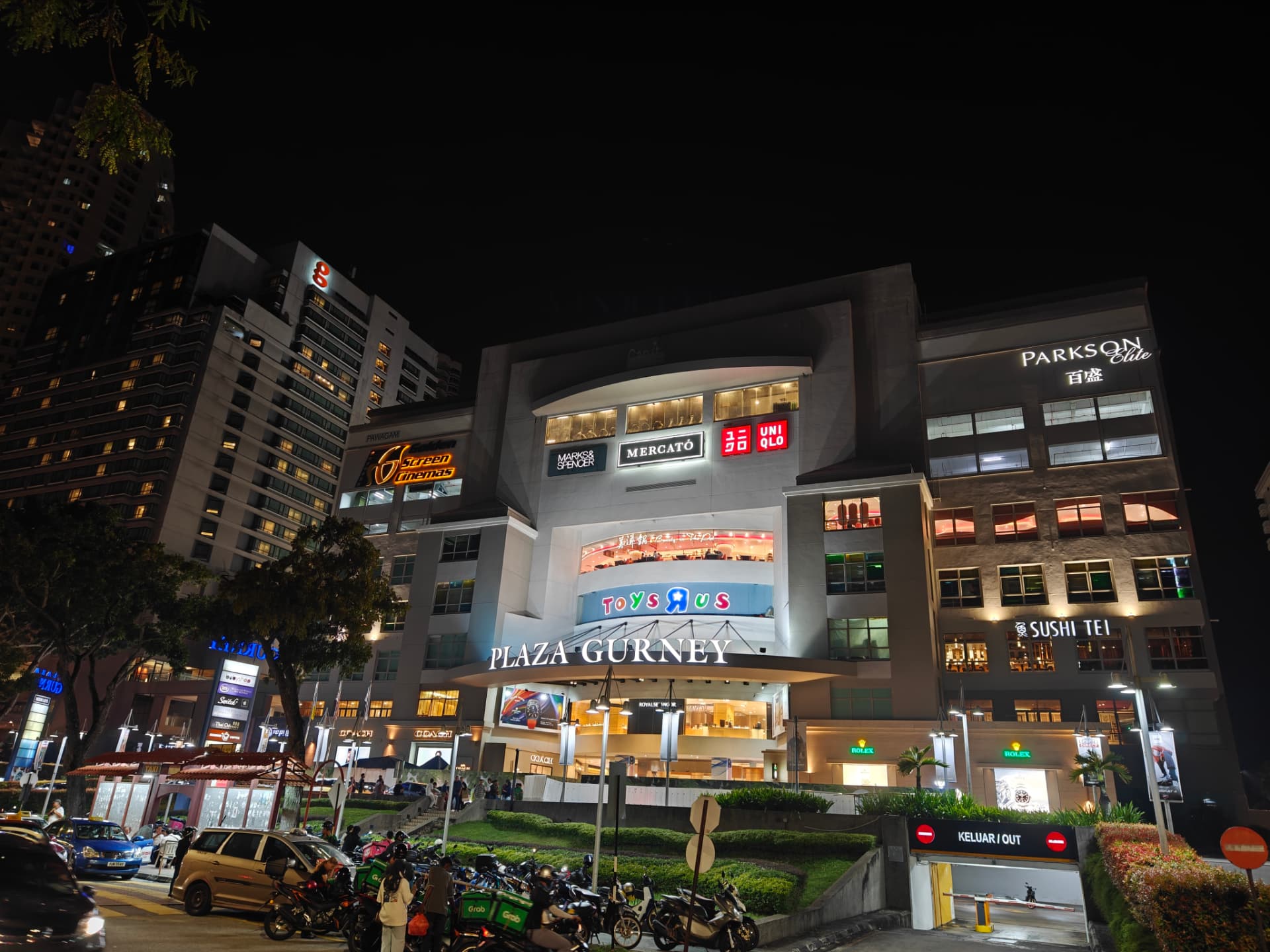 Gurney Plaza lit up at night, a short drive from The Andaman Island